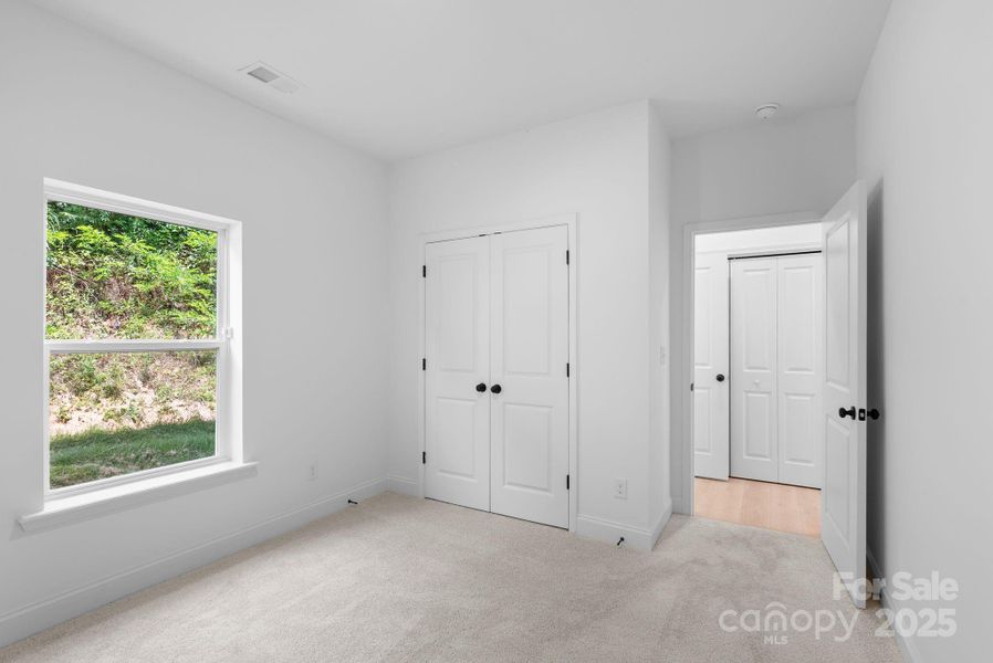 Spacious, unfurnished interior of a new home in , Asheville (Image 19).