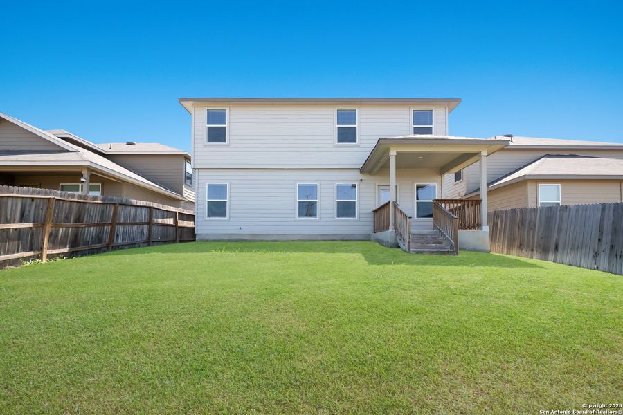 Front exterior of a new home in Laurel Vistas, San Antonio, TX, highlighting curb appeal (Image 1). Front exterior of a new home in Laurel Vistas, San Antonio, TX, highlighting curb appeal (Image 1).