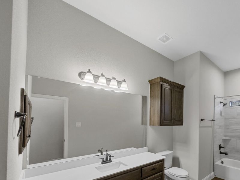 Representative furnished interior of a home built from the Eliot II by Robbie Hale Homes in High Meadows Estates, Nevada (Image 8). Representative furnished interior of a home built from the Eliot II by Robbie Hale Homes in High Meadows Estates, Nevada (Image 8).