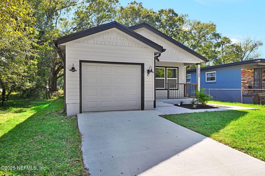 Front exterior of a new home in , Jacksonville, FL, highlighting curb appeal (Image 2). Front exterior of a new home in , Jacksonville, FL, highlighting curb appeal (Image 2).