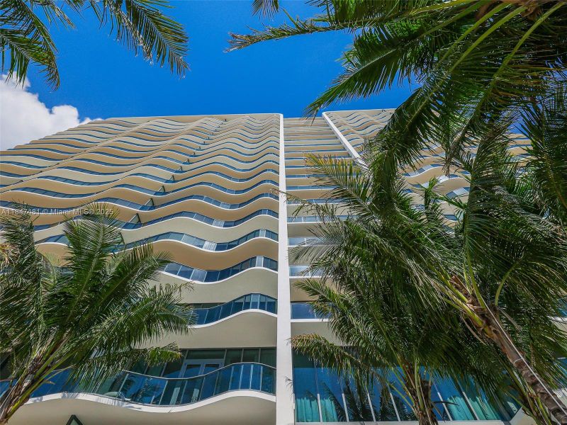 Front exterior of a new home in Casamar, Pompano Beach, FL, highlighting curb appeal (Image 31). Front exterior of a new home in Casamar, Pompano Beach, FL, highlighting curb appeal (Image 31).