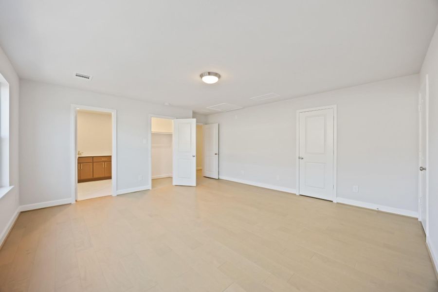 From this angle, the third-floor bedroom shows off its generous scale even more—roomy, light-filled, and designed to flex with your lifestyle. With wood floors throughout and multiple access points to storage, it’s a private retreat that truly lives large. From this angle, the third-floor bedroom shows off its generous scale even more—roomy, light-filled, and designed to flex with your lifestyle. With wood floors throughout and multiple access points to storage, it’s a private retreat that truly lives large.