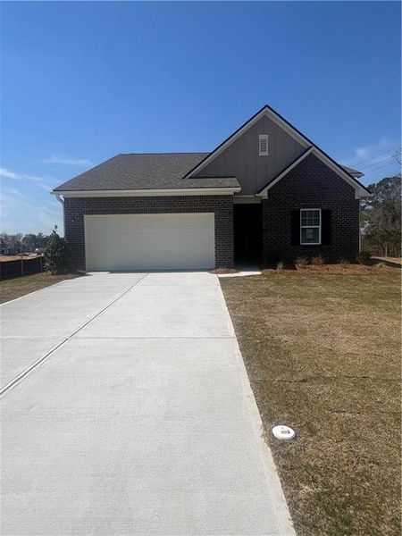 Front exterior of a new home in Silverton, Dacula, GA, highlighting curb appeal (Image 1). Front exterior of a new home in Silverton, Dacula, GA, highlighting curb appeal (Image 1).