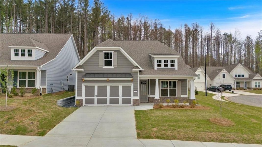 Front exterior of a new home in Stratford at NatureWalk, Dallas, GA, highlighting curb appeal (Image 26).