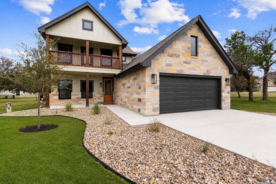 Front exterior of a new home in , Bandera, TX, highlighting curb appeal (Image 23).