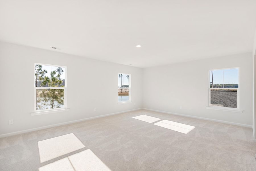Spacious, unfurnished interior of a new home in Sweetgrass at Summers Corner, Summerville (Image 15).
