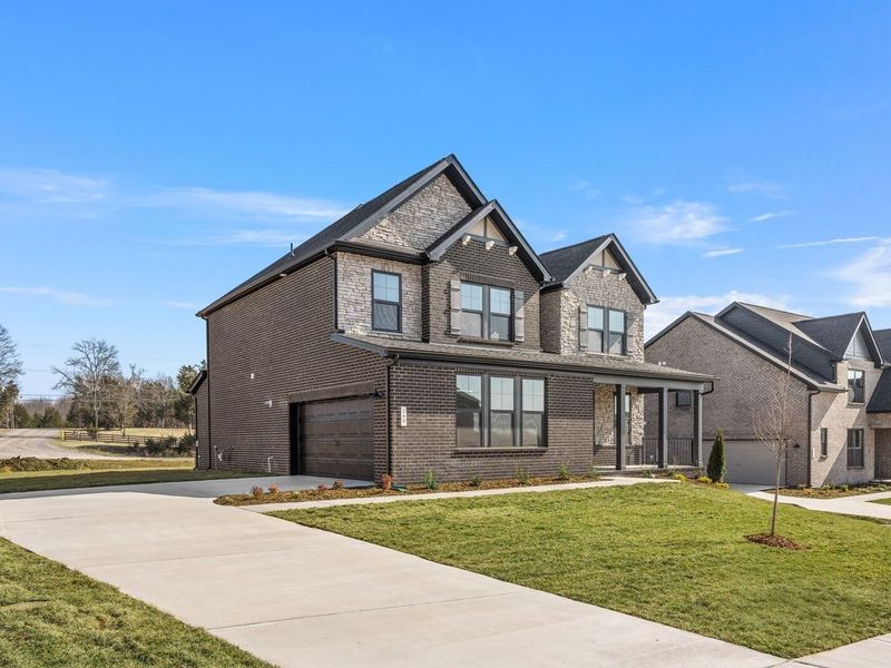 Front exterior of a new home in Benders Cove, Mount Juliet, TN, highlighting curb appeal (Image 27).