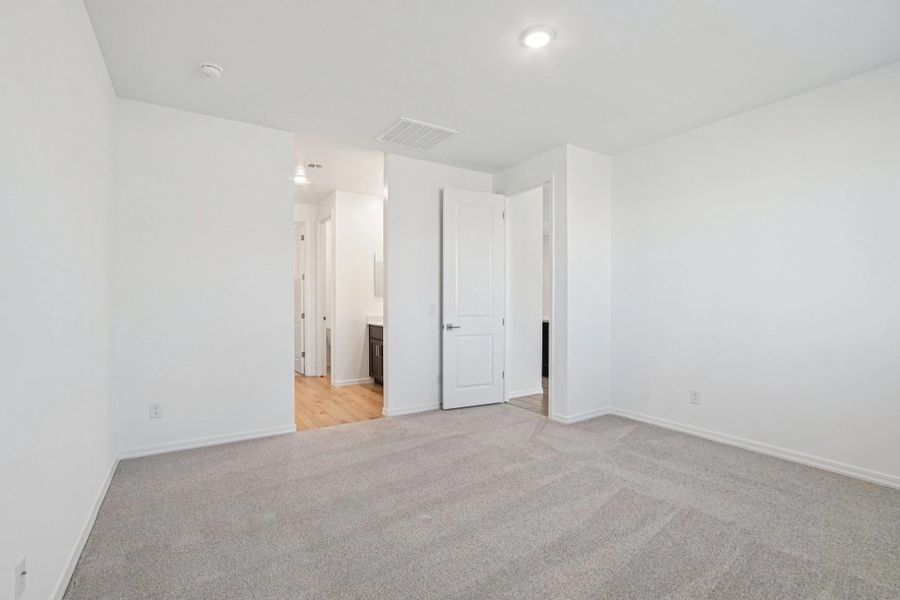 Primary suite. Not actual home, finishes and options may vary by community.