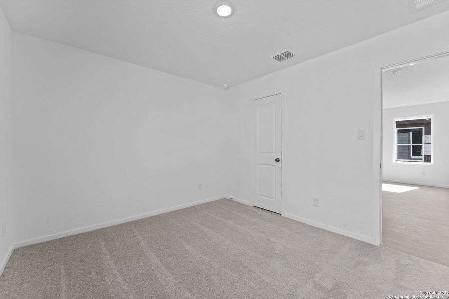 Spacious, unfurnished interior of a new home in Randolph Crossing: Cottage Collection, Converse (Image 14).
