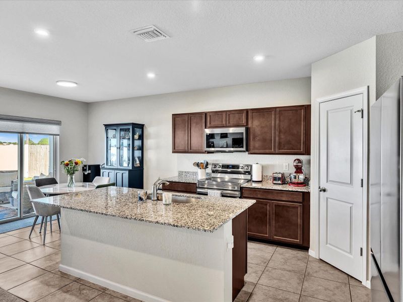 Furnished interior view inside a new home in , Belle Glade (Image 16).