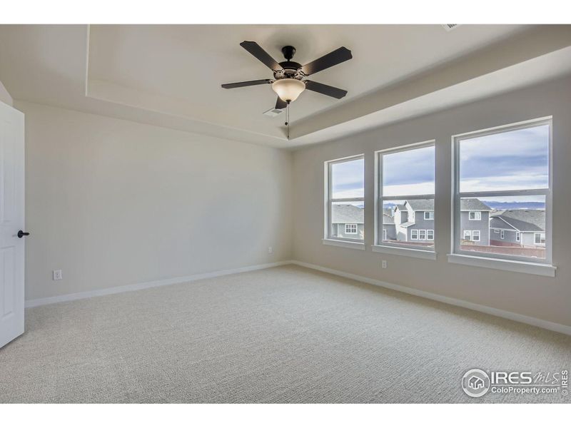 Spacious, unfurnished interior of a new home in RainDance National 60/70, Windsor (Image 20).