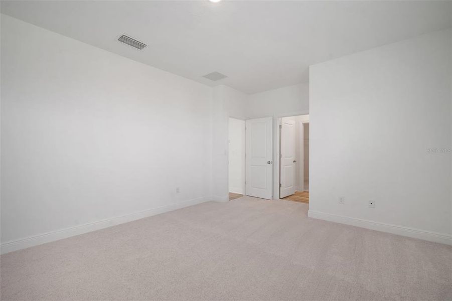 Spacious, unfurnished interior of a new home in North River Ranch, Parrish (Image 47).