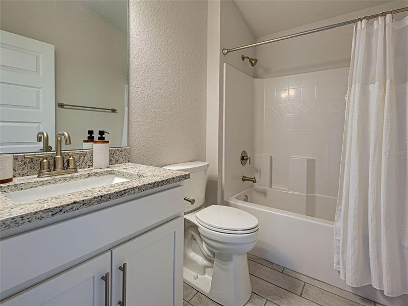 Furnished interior view inside a new home in Watercress Cove, North Port (Image 32).