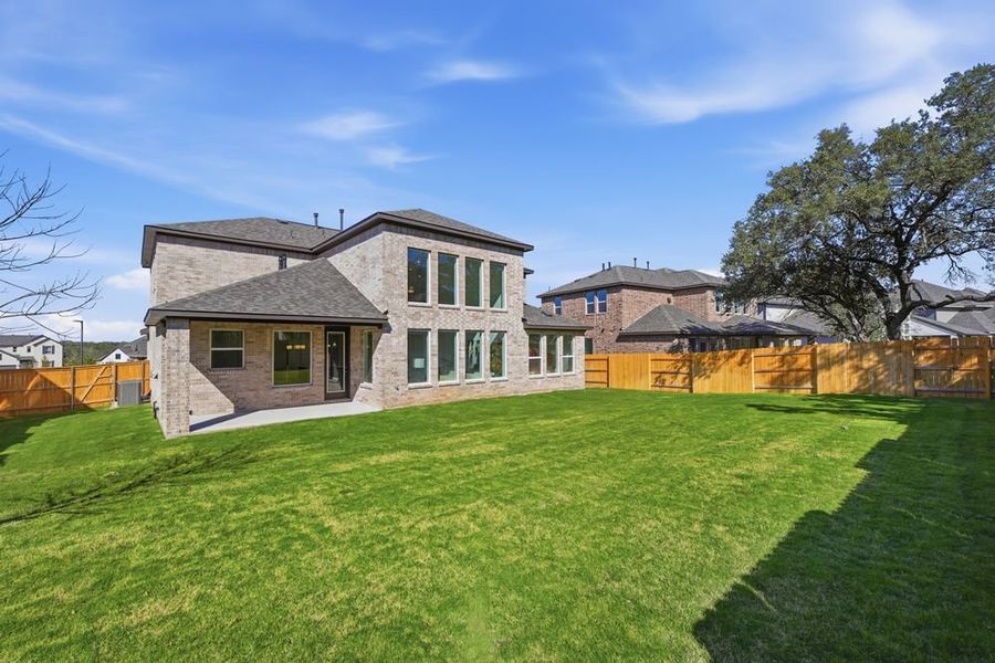 Exterior details and patio area of a home in Parkside on the River 60s, Georgetown (Image 4).