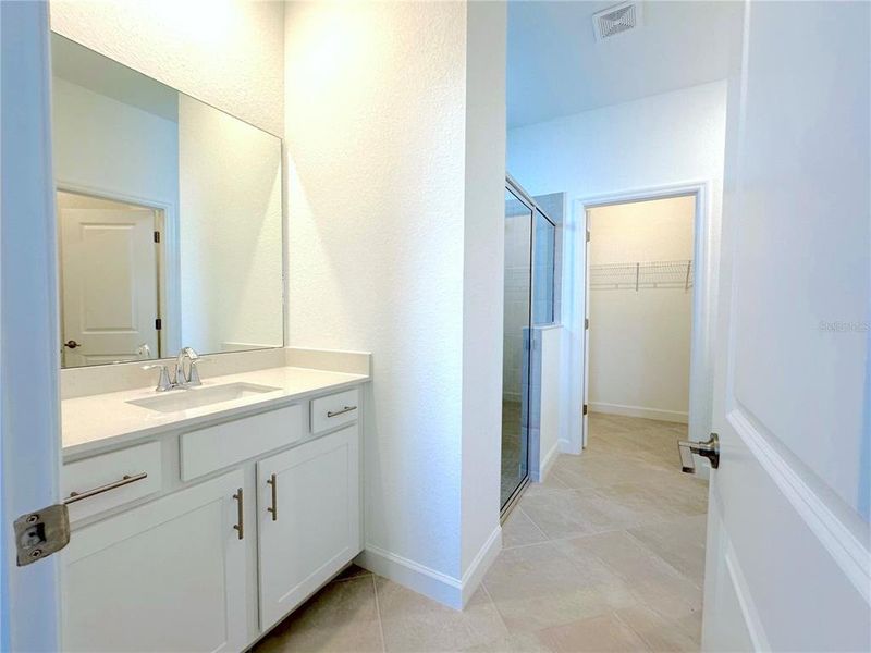 Furnished interior view inside a new home in Palm Lake at Coco Bay, Englewood (Image 8).