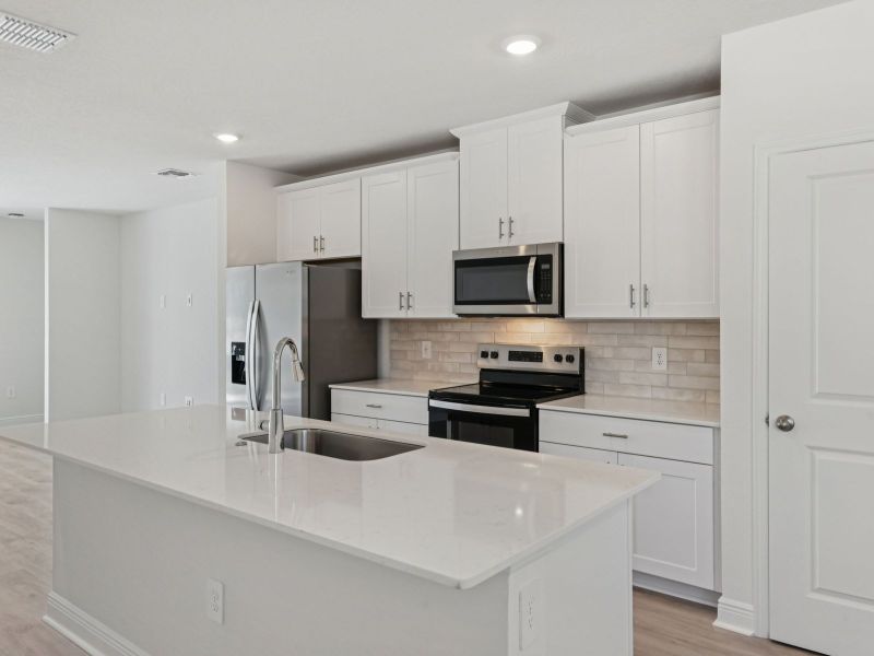 Furnished interior view inside a new home in The Reserve at Hammock Oaks - Classic Series, Lady Lake (Image 5).