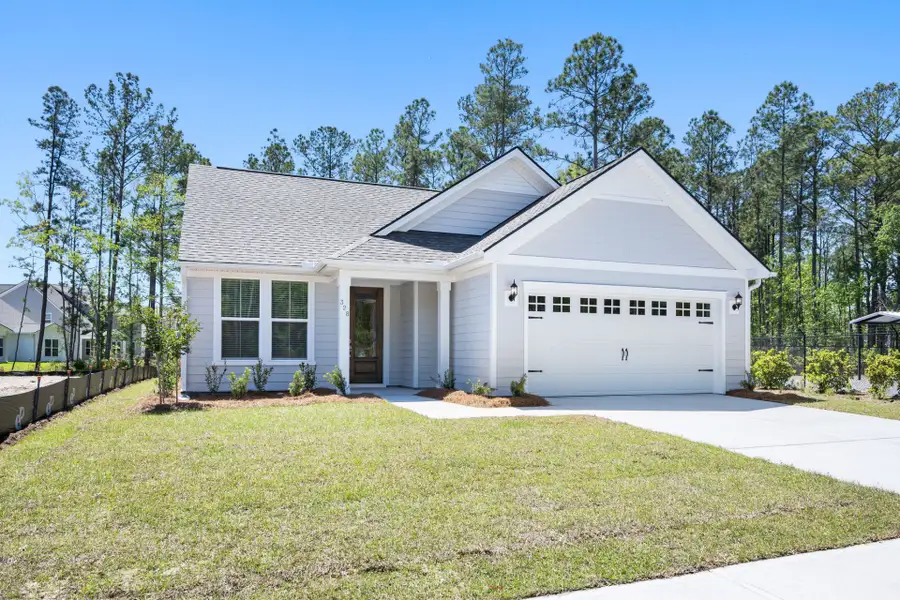 Front exterior of a new home in Waterways, Richmond Hill, GA, highlighting curb appeal (Image 2). Front exterior of a new home in Waterways, Richmond Hill, GA, highlighting curb appeal (Image 2).