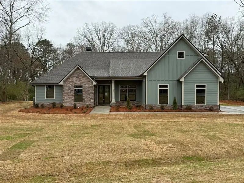 Front exterior of a new home in , Monroe, GA, highlighting curb appeal (Image 1). Front exterior of a new home in , Monroe, GA, highlighting curb appeal (Image 1).