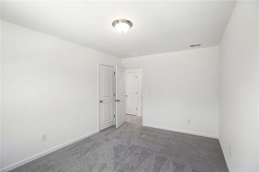 Spacious, unfurnished interior of a new home in The Pointe at Heron Bay, Locust Grove (Image 35).