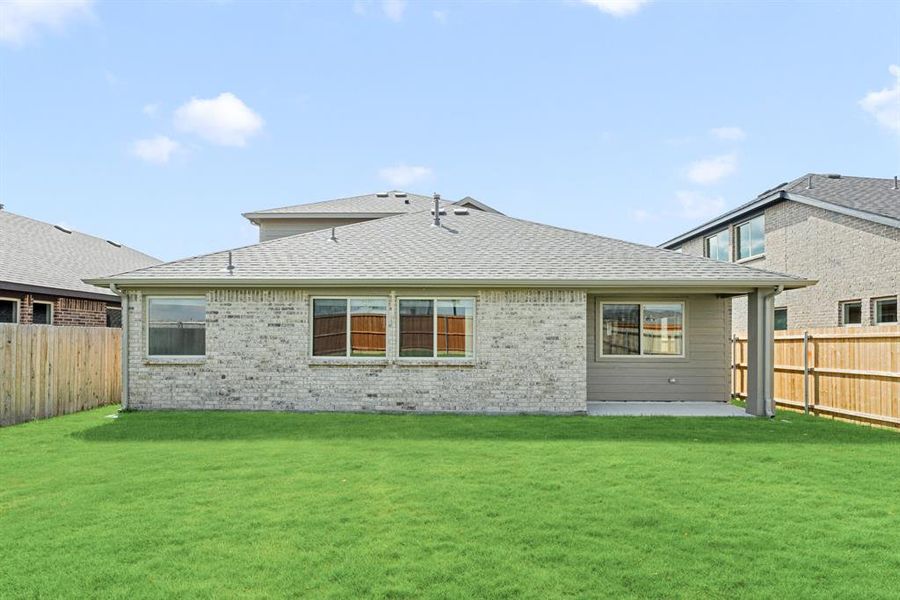 Front exterior of a new home in Heartland Elements, Heartland, TX, highlighting curb appeal (Image 23). Front exterior of a new home in Heartland Elements, Heartland, TX, highlighting curb appeal (Image 23).