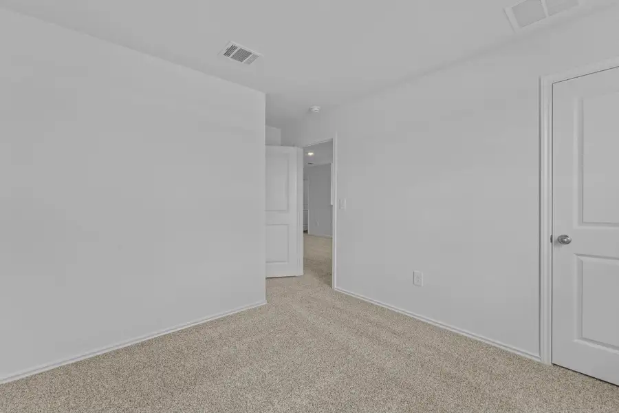 Spacious, unfurnished interior of a new home in Prairie Lakes, Buda (Image 13). Spacious, unfurnished interior of a new home in Prairie Lakes, Buda (Image 13).