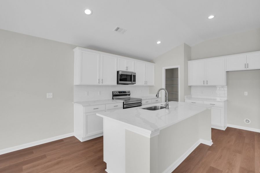 Representative furnished interior of a home built from the The Aspen by Smith Family Homes in Sweetwater, Brunswick (Image 5).