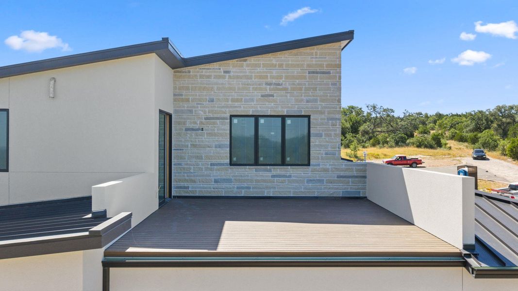 An inviting exterior deck with modern architectural elements, perfect for outdoor enjoyment. An inviting exterior deck with modern architectural elements, perfect for outdoor enjoyment.