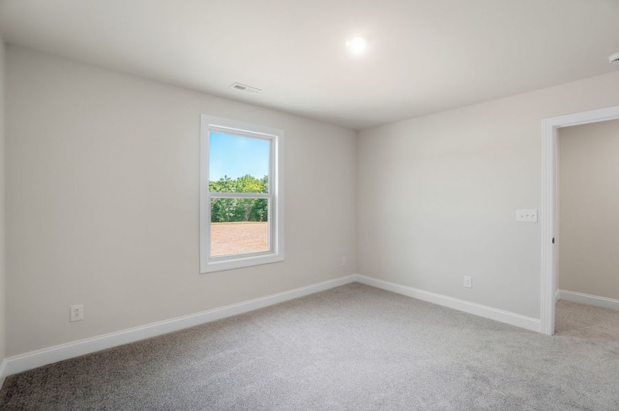 Spacious, unfurnished interior of a new home in Blair Place, Monroe (Image 39). Spacious, unfurnished interior of a new home in Blair Place, Monroe (Image 39).