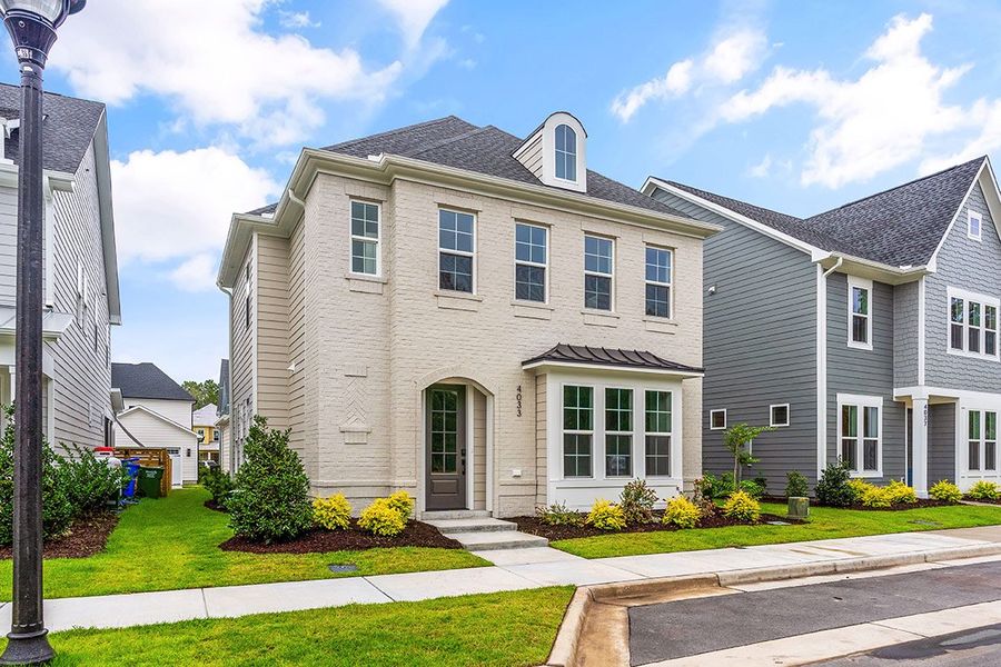 Representative exterior photo of a completed home built from the The Wisteria by RobuckHomes in East & Mason, Wilmington, NC (Image 29).
