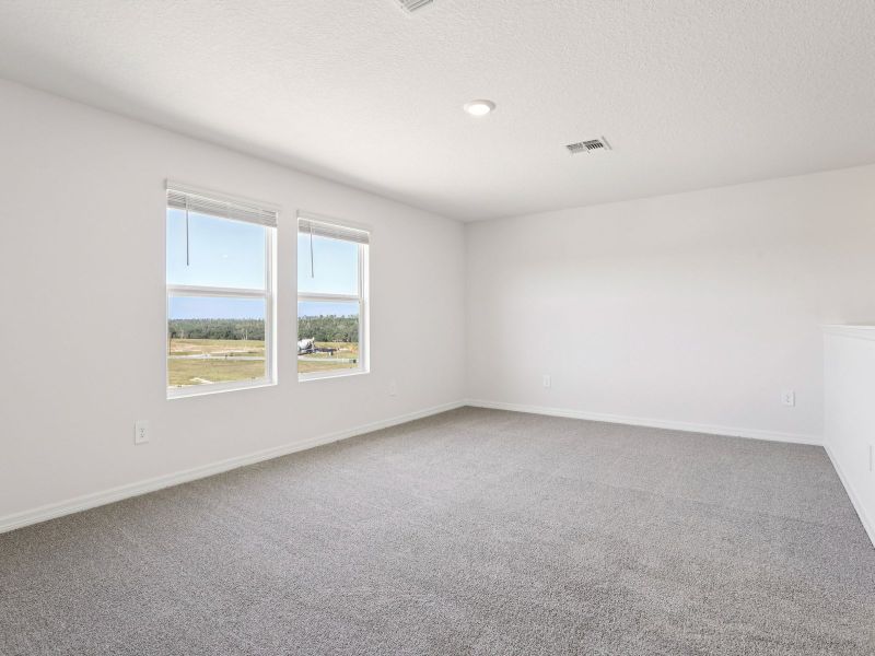 Spacious, unfurnished interior of a new home in The Grove at Stuart Crossing - Classic Series, Bartow (Image 17).