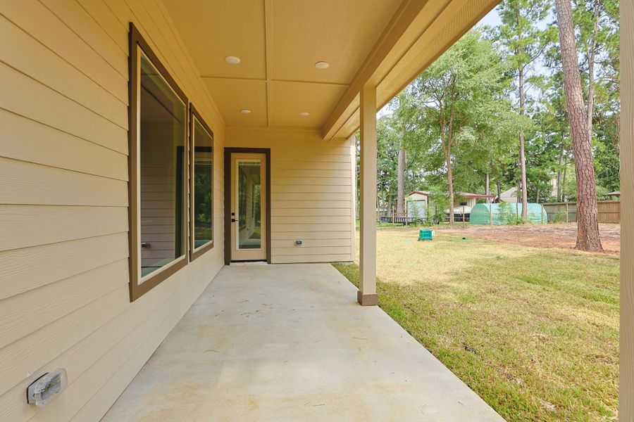 Exterior details and patio area of a home in , Magnolia (Image 29).