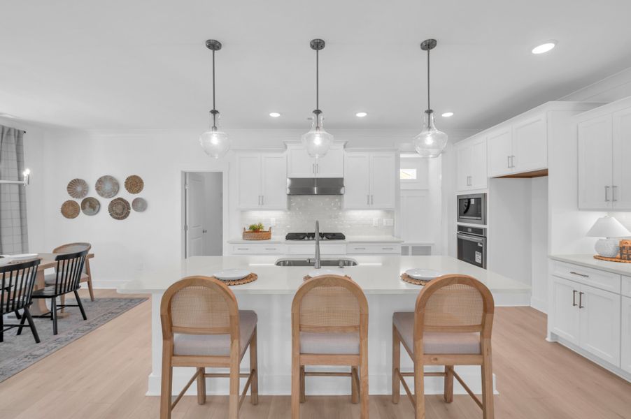 Representative furnished interior of a home built from the The Whitley by RobuckHomes in Windwater, Hampstead (Image 19).