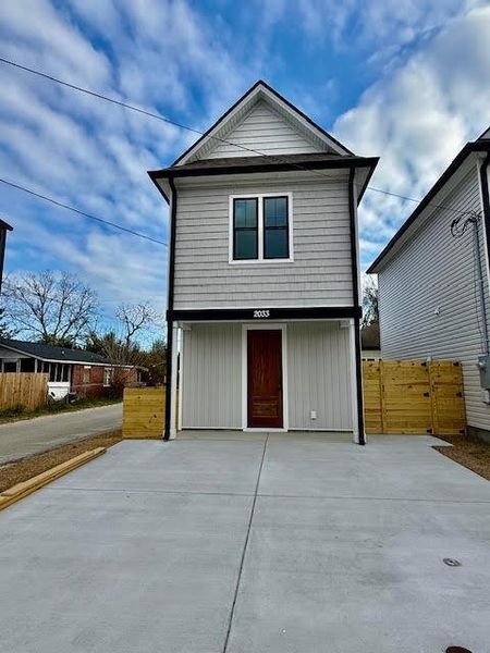 Front exterior of a new home in , North Charleston, SC, highlighting curb appeal (Image 19).