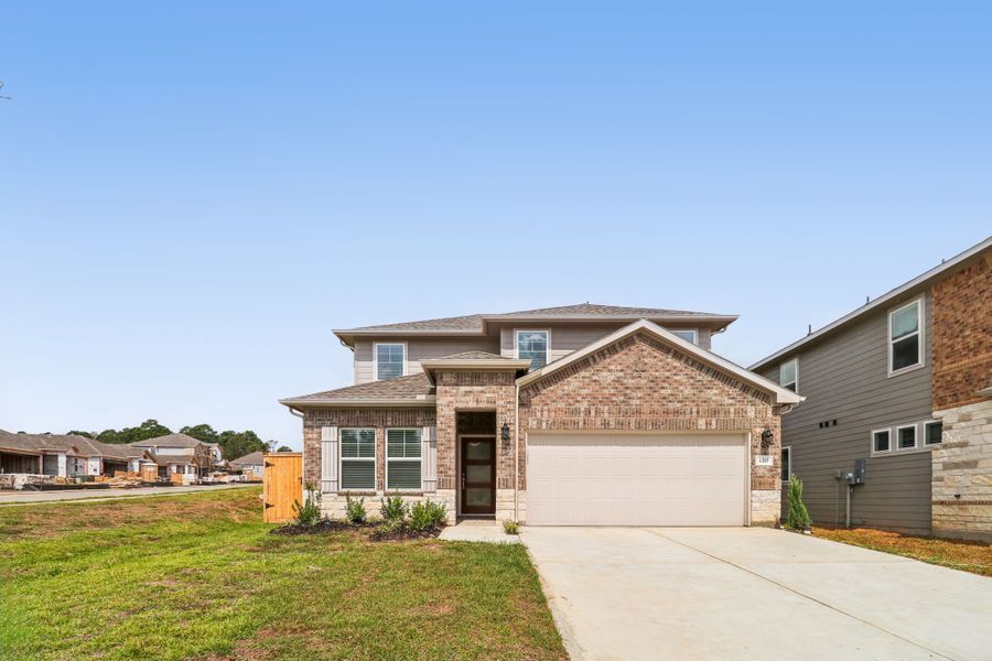 The exterior of a home in Pine Lake Cove of Conroe, TX.