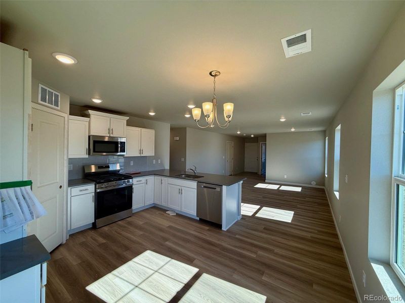 Furnished interior view inside a new home in Sky Ranch - Highland Collection, Watkins (Image 2). Furnished interior view inside a new home in Sky Ranch - Highland Collection, Watkins (Image 2).