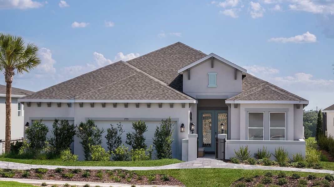 Representative exterior photo of a completed home built from the Pallazio II by Taylor Morrison in Esplanade at McKinnon Groves, Winter Garden, FL (Image 1). Representative exterior photo of a completed home built from the Pallazio II by Taylor Morrison in Esplanade at McKinnon Groves, Winter Garden, FL (Image 1).