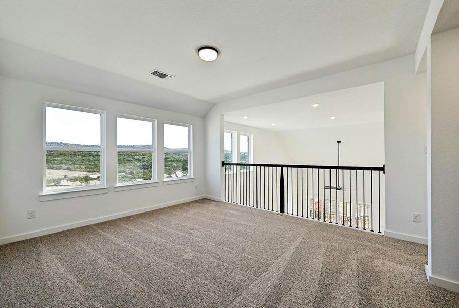 Spare room with carpet and recessed lighting