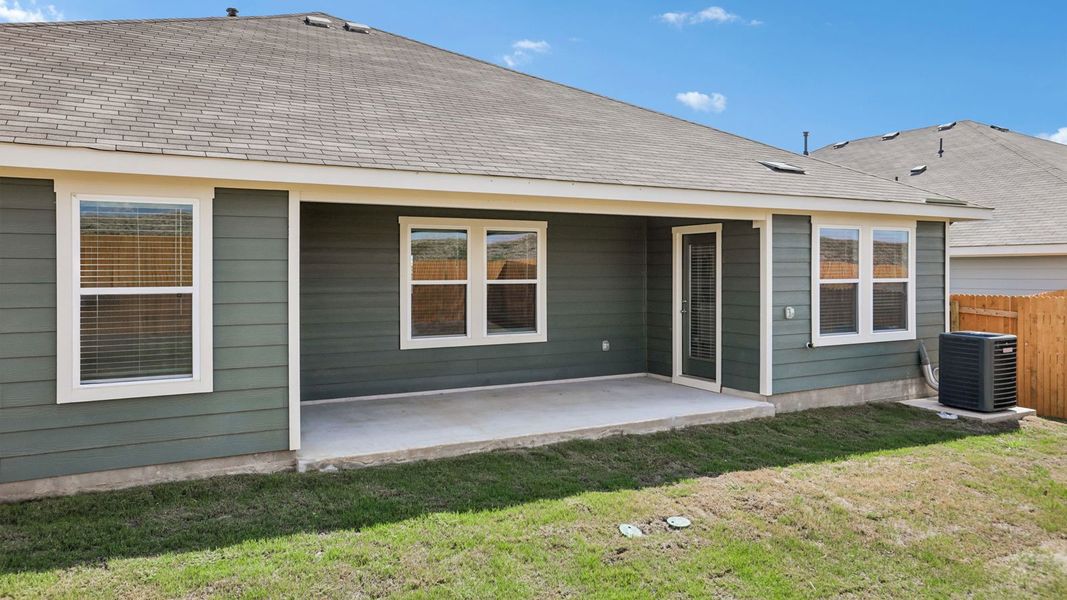 Exterior details and patio area of a home in Prairie Lakes, Buda (Image 25).