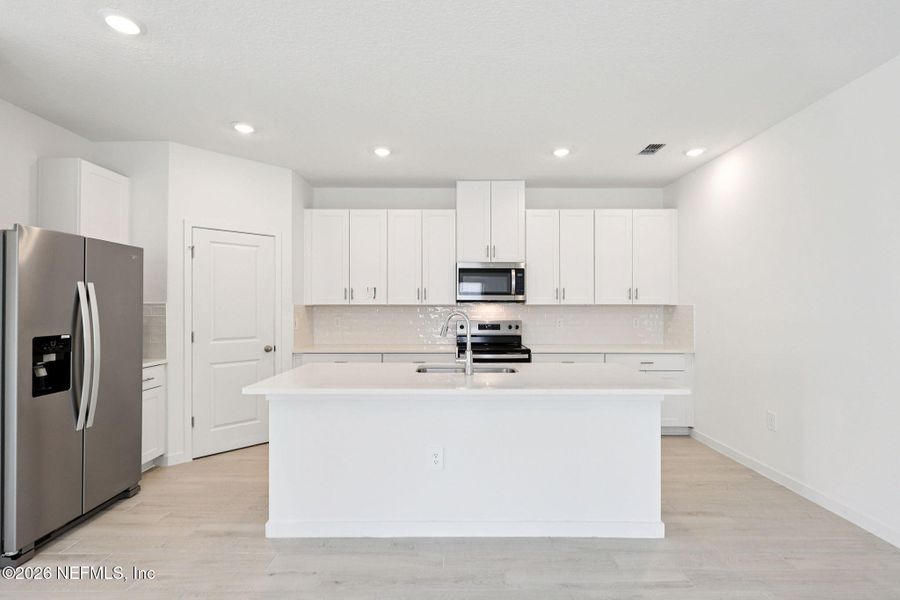 Furnished interior view inside a new home in Flagler Village - Signature Series, Palm Coast (Image 5).