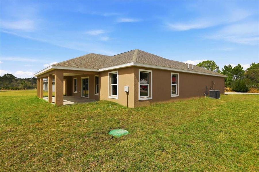 Exterior details and patio area of a home in , Sebring (Image 23).
