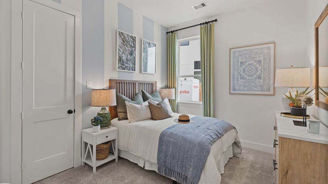 Representative furnished interior of a home built from the Hillcrest by Chesmar Homes in Artavia, Conroe (Image 20).