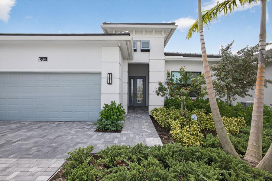 Exterior details and patio area of a home in , The Acreage (Image 1). Exterior details and patio area of a home in , The Acreage (Image 1).