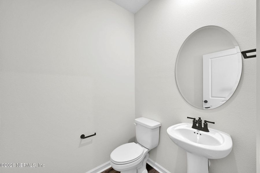 Furnished interior view inside a new home in Baxley Villas, Middleburg (Image 8).