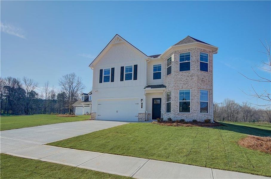 Front exterior of a new home in Chapel Hill, Newnan, GA, highlighting curb appeal (Image 15).