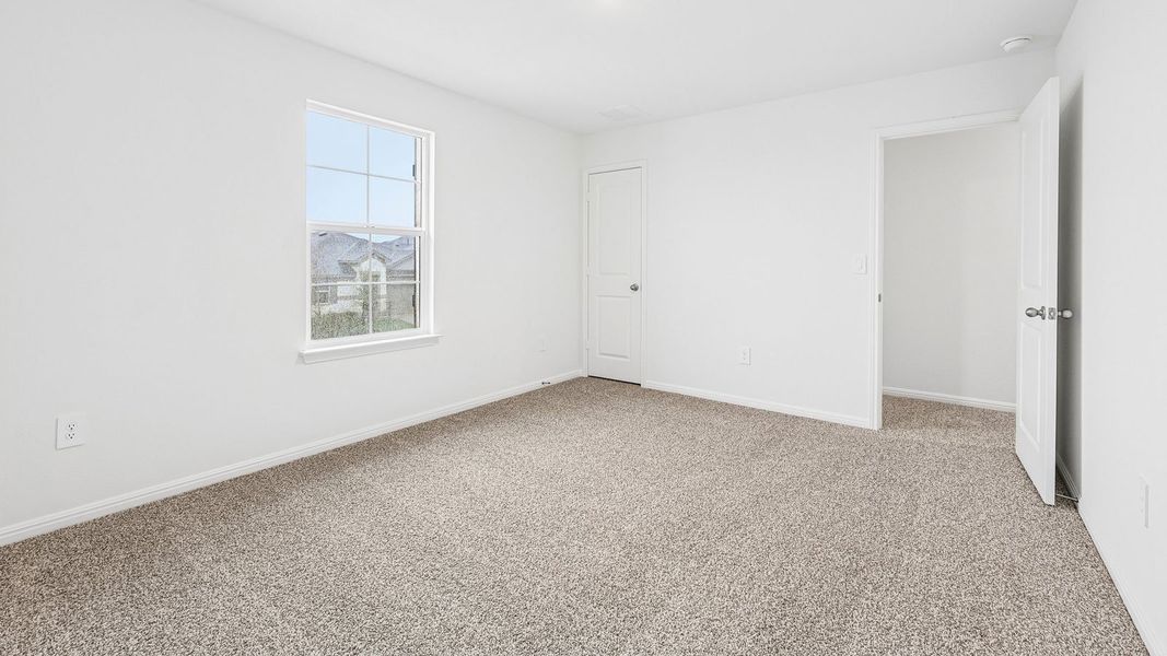 Spacious, unfurnished interior of a new home in Bar W Ranch, Leander (Image 37).