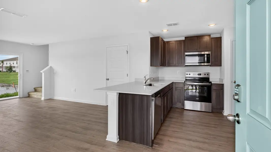 Representative furnished interior of a home built from the Weston by D.R. Horton in Bridle Creek Townhomes, Jacksonville (Image 4).
