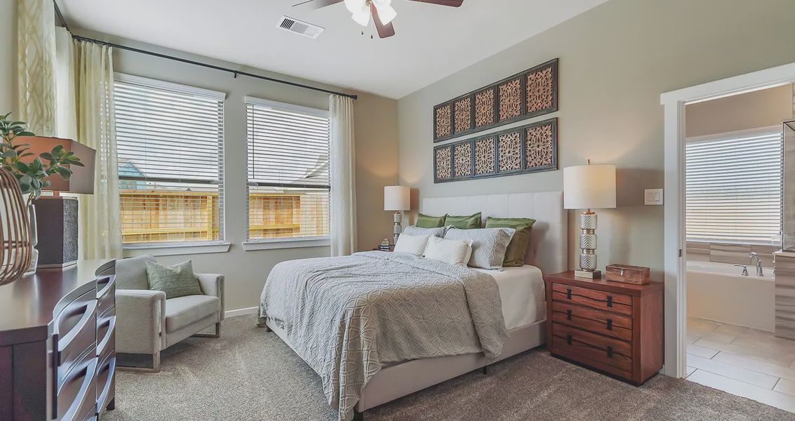 Representative furnished interior of a home built from the Orlando by Chesmar Homes in The Trails, New Caney (Image 9).