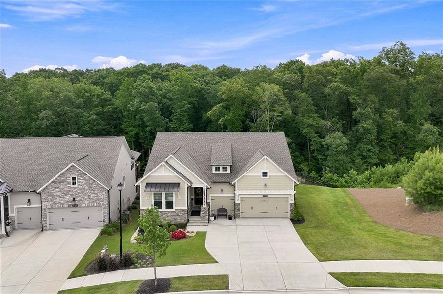 Front exterior of a new home in , Flowery Branch, GA, highlighting curb appeal (Image 2). Front exterior of a new home in , Flowery Branch, GA, highlighting curb appeal (Image 2).