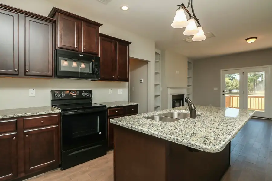 Representative furnished interior of a home built from the Furyk by RiverWILD Homes in Riverwood Ranch, Clayton (Image 14).