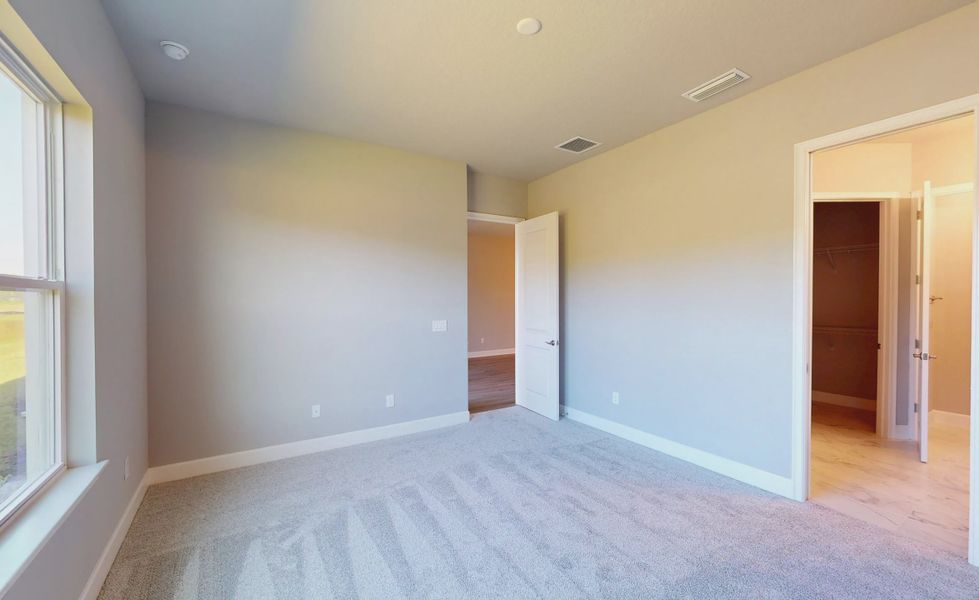 Spacious, unfurnished interior of a new home in Woodhaven, Port Orange (Image 15).